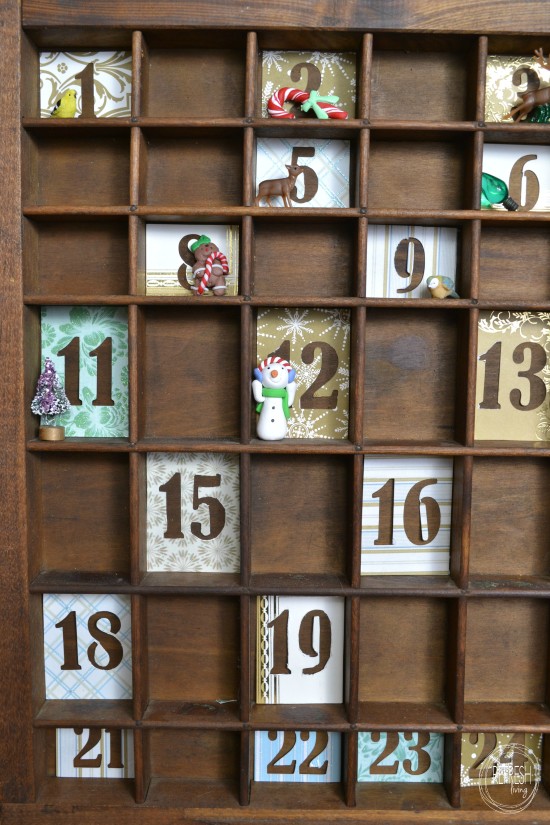 What a cool idea for an advent calendar - use a vintage printer's tray!